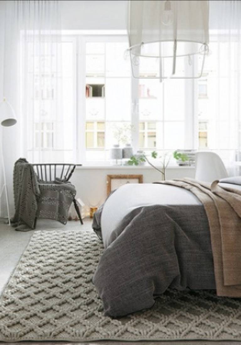 Diez ideas para decorar tu dormitorio con un relleno nórdico